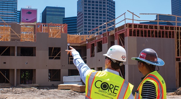 man pointing to construction site